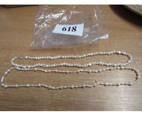  Sale Item:    2 STRINGS FRESHWATER PEARLS   Vat Status:   No Vat   Buyers Premium:  This lot is subject to a Buyers Premium 