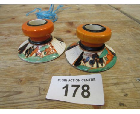  Sale Item:    PAIR FANTASQUE CLARICE CLIFF CANDLE STICKS (AF)  Vat Status:   No Vat   Buyers Premium:  This lot is subject t