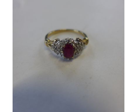 A hallmarked 9ct ruby and diamond ring, diamond 0.25ct, size P, approx 3 grams, generally good 