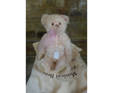 A Steiff Teddy Moh Rose Musical Bear - made to commemorate Princess Diana, it plays Candle in the Wind and is limited to 4000