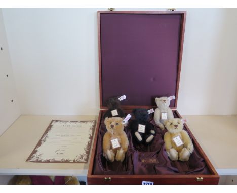 A Steiff Baby Bear set 1989 to 1993 - in mahogany case, limited to 1847 - and made in 1997 - each of the five bears are 16cm 