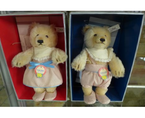 A Steiff Teddy Baby boy and Teddy Baby Girl, both 1930 replicas and limited edition, made in 1993, 25cm tall, EAN 407529 and 