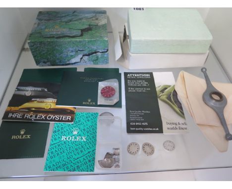 A collection of Rolex items, to include Rolex burgundy coloured gents perpetual datejust dial unused in Rolex bag, other dial
