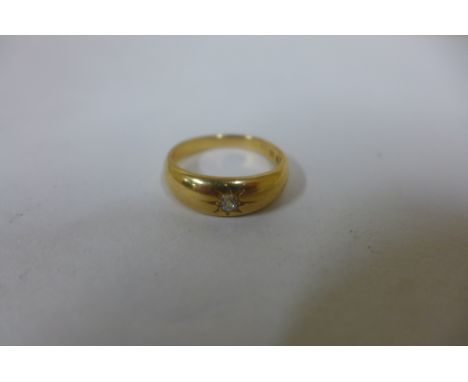 An 18ct yellow gold hallmarked diamond solitaire ring, size Q, approx 6.4 grams 