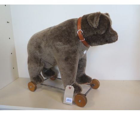 A Steiff bear on wheels 1921 replica, made in 2003 limited to 1500 EAN 400384 