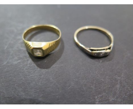 An 18ct Italian gold ring set with a small square white stone, size O and a gold and platinum ring set with three small diamo