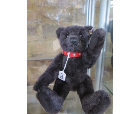 A Steiff Black Bear made in 2004 - limited to 3000 EAN 038150 - 32cm tall with box and certificate 