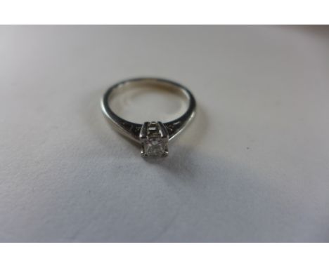 An 850 platinum diamond solitaire ring, diamond 0.25ct, square cut, size K, approx 4 grams, diamond bright, some usage marks 