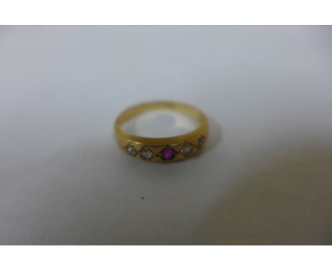 An 18ct ruby and diamond ring, size O, approx 2.9 grams, marked 18ct 