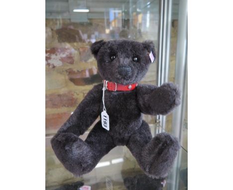 A Steiff Black Bear made in 2004 - limited to 3000 EAN 038150 - 32cm tall with box and certificate 