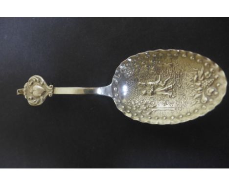 A large caddy spoon with continental hallmarks and later English hallmarks, London 1896 sponsor Edwin Thompson-Bryant, very c