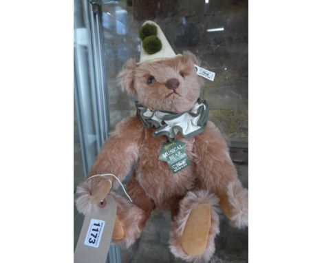 A Steiff Musical Bear clown, made exclusively for Harrods in 1992 - limited to 2000, EAN 011894 - 42cm tall, with box and cer