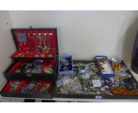 A large quantity of costume jewellery and watches, including a gold plated bangle 