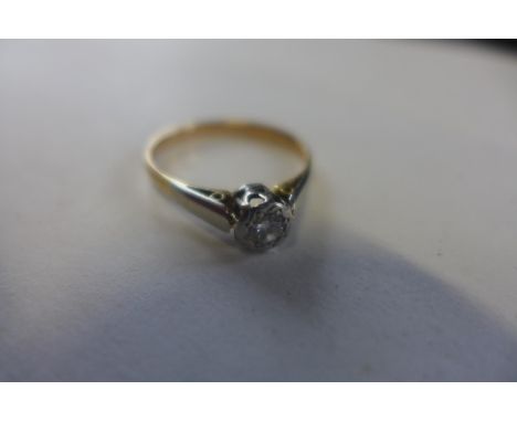 An 18ct gold diamond solitaire ring, marked 18ct, size P, approx 2.2 grams, some general usage 