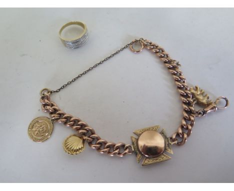 A 9ct rose gold watch chain bracelet with yellow and rose gold 9ct fob acting as a joining link, three x 9ct charms and dog c