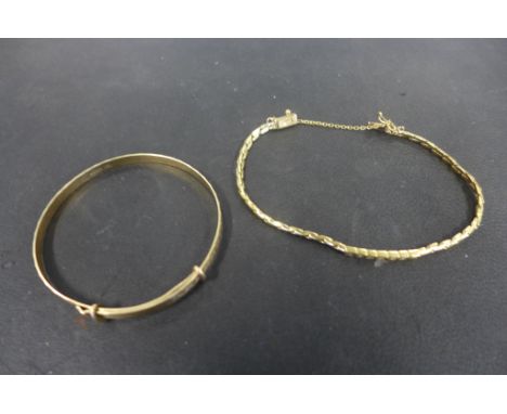 A 9ct expanding bangle, with bright cut decoration fully hallmarked and a 9ct woven link bracelet, set with small diamonds, h