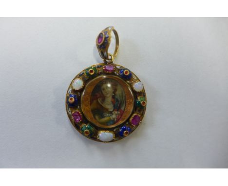 A very pretty gold ruby and opal enameled pendant locket with a well painted miniature  of a lady, 23mm wide, weight approx 1