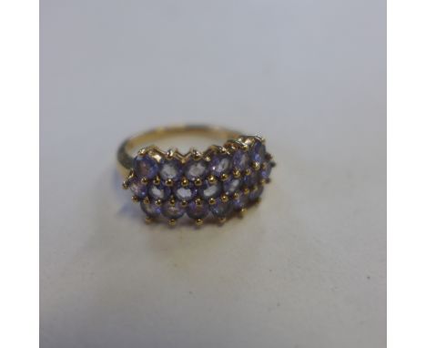 A 9ct hallmarked tanzanite set ring, size N, approx 3.8 grams, generally good 