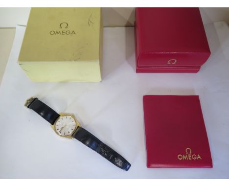 A Gents Omega Geneve wristwatch with gold plated case, silvered dial with baton markers and central seconds sweep, manual win