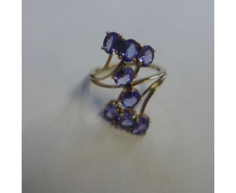 A 9ct hallmarked tanzanite set ring, size Q, approx 3.6 grams, generally good 