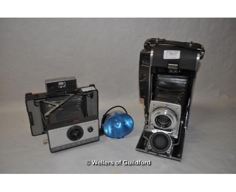 Polaroid Rangefinder Prontor-SVS camera with Rodenstock-Ysarex 1:4.7 127mm lens (4072773); together with a Polaroid Land came