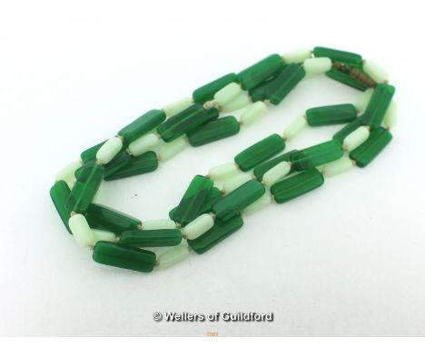 *Vintage Opaline green uranium glass flapper length hand-knotted necklace (Lot subject to VAT)