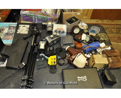 Quantity of camera accessories including tripod, flashes etc