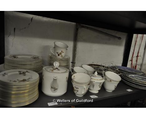 Royal Worcester part dinner service with golden brown foliage on white ground, comprises 10 each of dinner and dessert plates