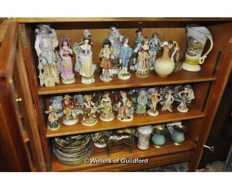 A large quantity of ceramic figurines, vases, collectors' plates and a modern Japanese metal model of a horse.