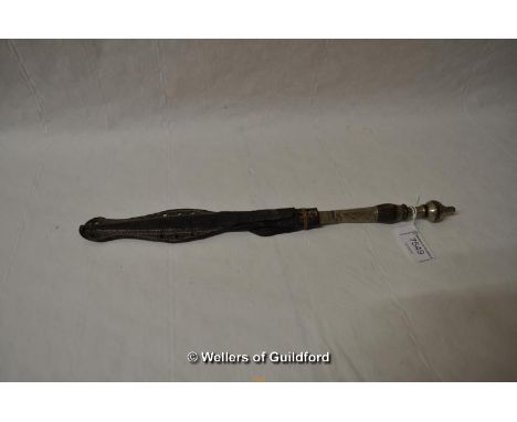 An Indian dagger with white metal and wooden handle in leather scabbard; length of blade 19.25cm, overall length 33.5cm.