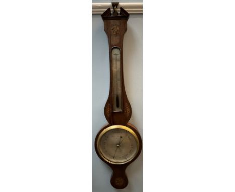 A 19th century mahogany banjo barometer with a architectural pediment above an alcohol thermometer and a silvered dial inscri