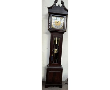 A Smallcombe of Essex modern longcase clock with a silvered dial and Roman  numerals, glazed trunk door and box base 