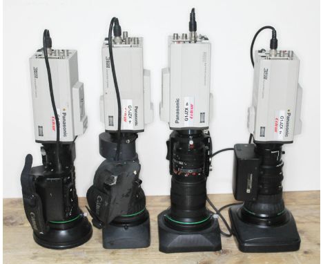 Four Panasonic 3CCD Convertible cameras, each with a zoom lens.  