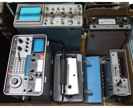 Assorted vintage radio electronics including am IFR FM/AM-1200S tone generator, a Tektronix 2235 100MHz oscilloscope, a Marco