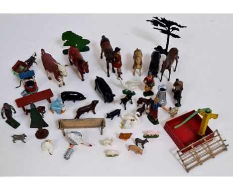 A collection of vintage metal farmyard toys  