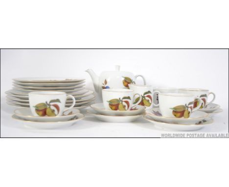 A good Royal Worcester Evesham tea service to include teapot, trio's, creamer etc