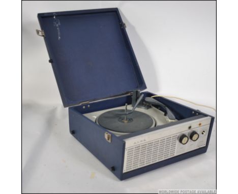 A retro  20th century four speed portable record player by Alba, having a lift up lid and carry handle to the side.
