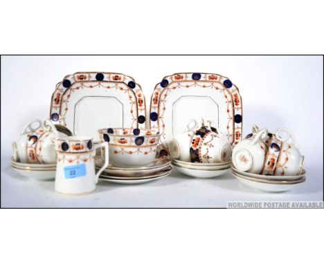 A good Victorian Imari style bone china patterned tea service consisting of trio's, creamer, sugar bowl, sandwich plates. Sta