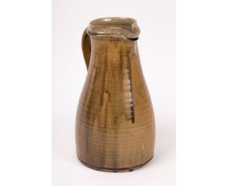 Mike Dodd (born 1943) a stoneware jug with green glaze, impressed marks, 35cm high  CONDITION REPORT: no obvious damage or re