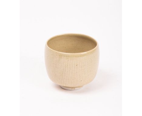 A Lowerdown pottery cup, light brown glaze with linear marks, impressed mark to base, 9cm diameter x 8.5cm high CONDITION REP