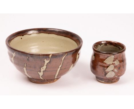 Mike Dodd (born 1943) a stoneware bowl with tenmoku glaze and pale linear decoration to exterior, impressed maker's mark to b