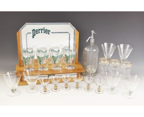 An illuminated "Perrier" advertising counter top display, late 20th century, comprising a shaped mirror behind four "Perrier"