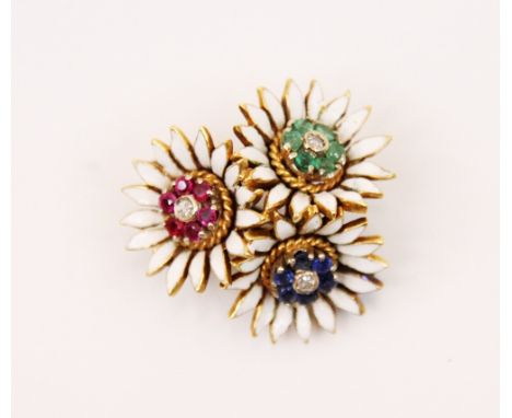 An enamelled ruby, sapphire, emerald and diamond brooch, the three flower heads modelled as astrantia with white enamel petal