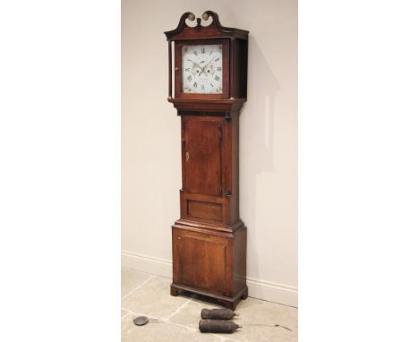 A late George III oak cased longcase clock signed 'Moses Evans, Llangernew', the twin swan neck hood with freestanding pillar