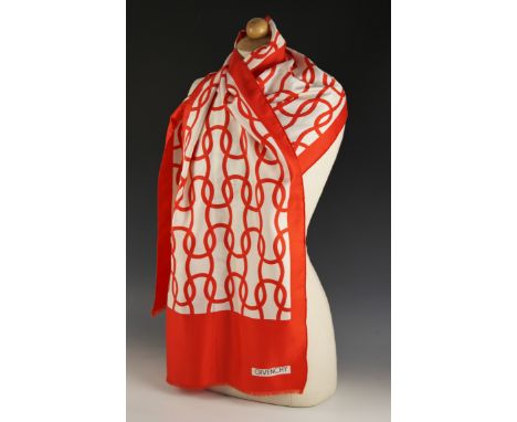 A Givenchy narrow scarf, with red chain style design to the centre surrounded by a red border, the long edges rolled, the sho