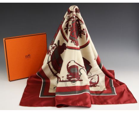 An Hermes silk scarf, in the 'Ex Libris' pattern designed by Hugo Grygkar, in wine and grey, with rolled hems, 90cm x 90cm, w