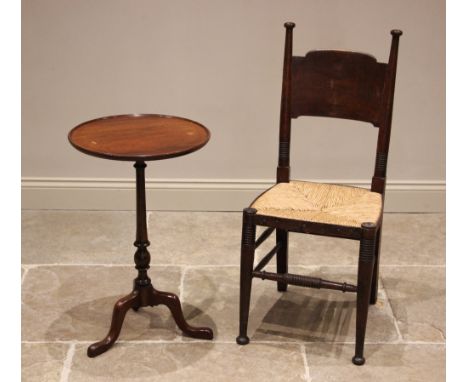 In the manner of William Birch for Liberty, an oak Arts and Crafts side chair, late 19th/early 20th century, with an envelope