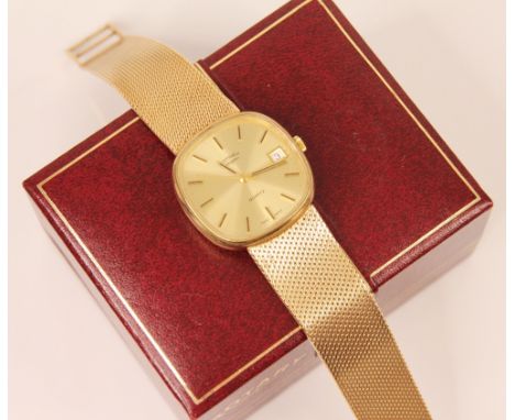A 9ct yellow gold Gentlemans Rotary wristwatch, the square champagne coloured dial with baton markers, case 35mm wide, set to