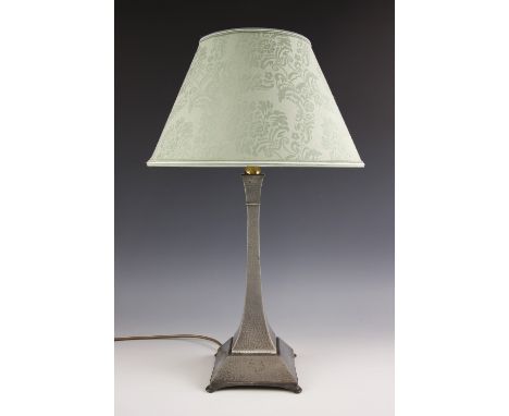 A 'Best English Pewter' Arts & Crafts style 'Hand Hammered' lamp base, of tapering square section with stepped base and upon 