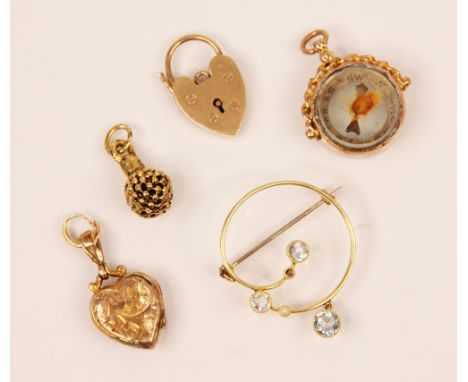 A selection of jewellery, including an Edwardian style aquamarine brooch, the swirl designed brooch with three round cut aqua